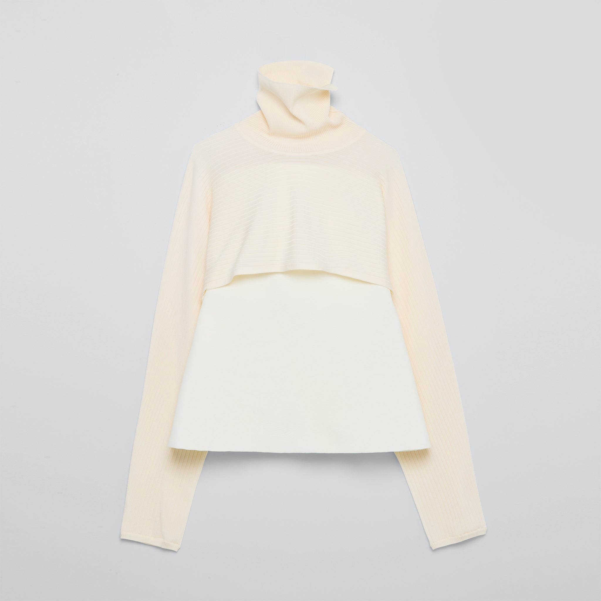 ペプラムプルオーバーニット