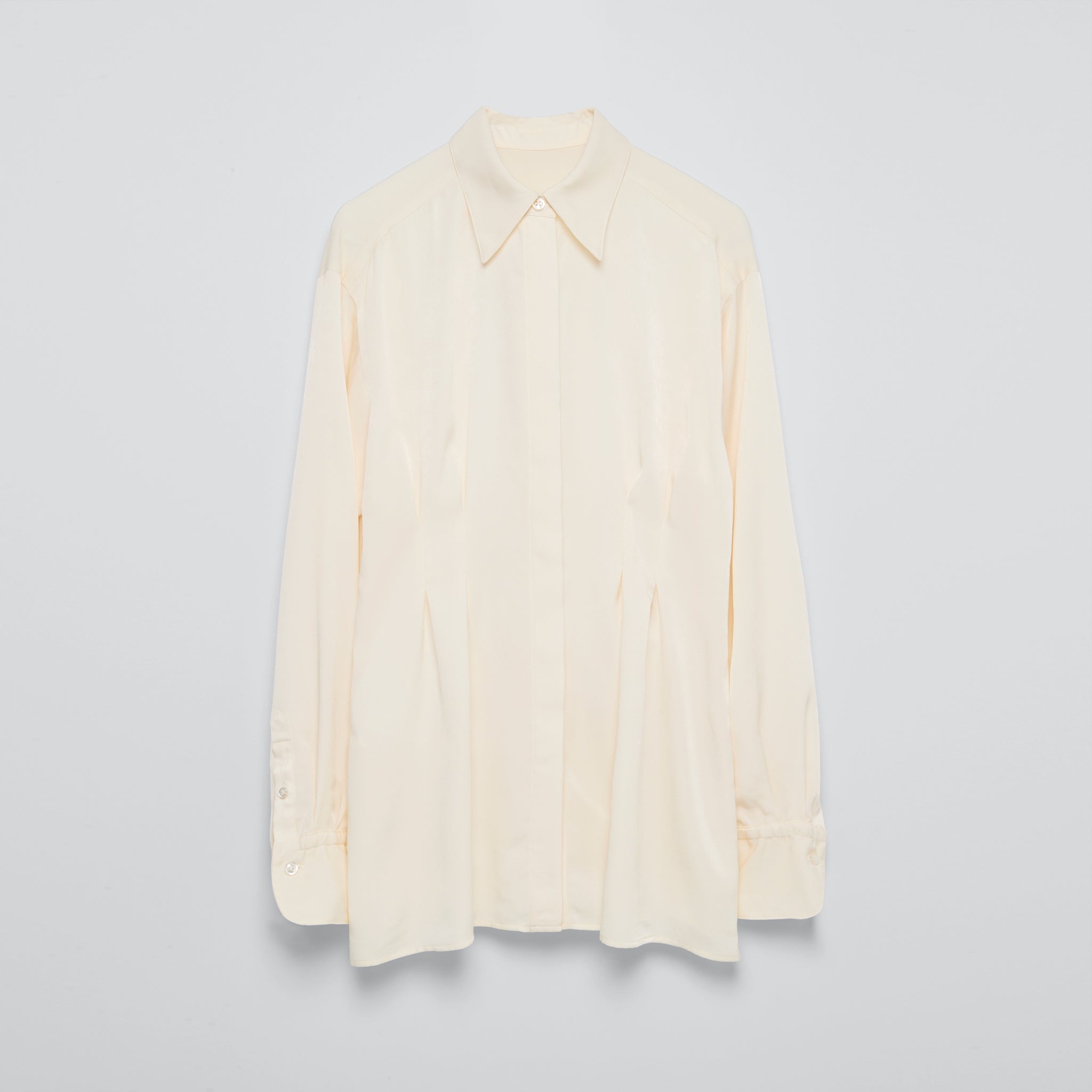 インバーテッドタックブラウス